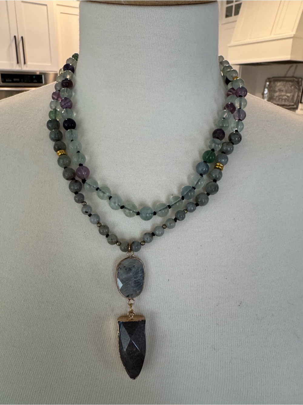 Multi-Strand Green and Purple Beaded Necklace with Dark Stone Pendant